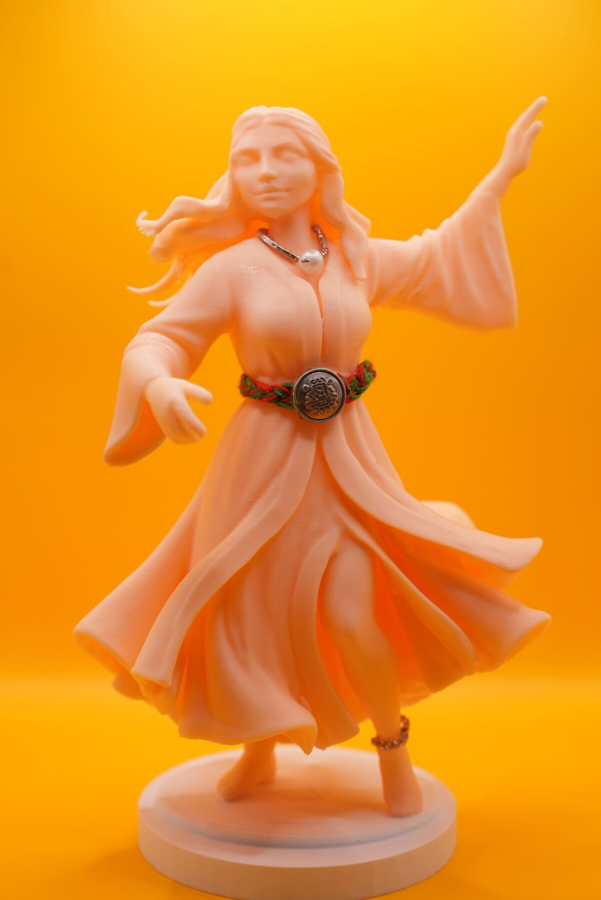 3D-printed PLA statue of the Diva of Moroccan Andalusian music, wearing traditional flowing dress and jewelry, with graceful dancing posture.