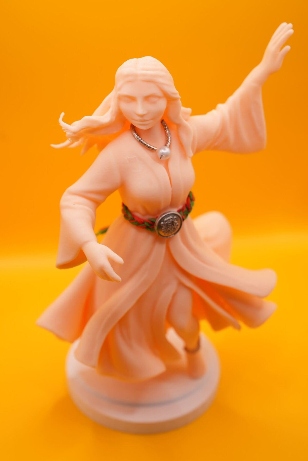3D-printed PLA statue of the Diva of Moroccan Andalusian music, wearing traditional flowing dress and jewelry, with graceful dancing posture.