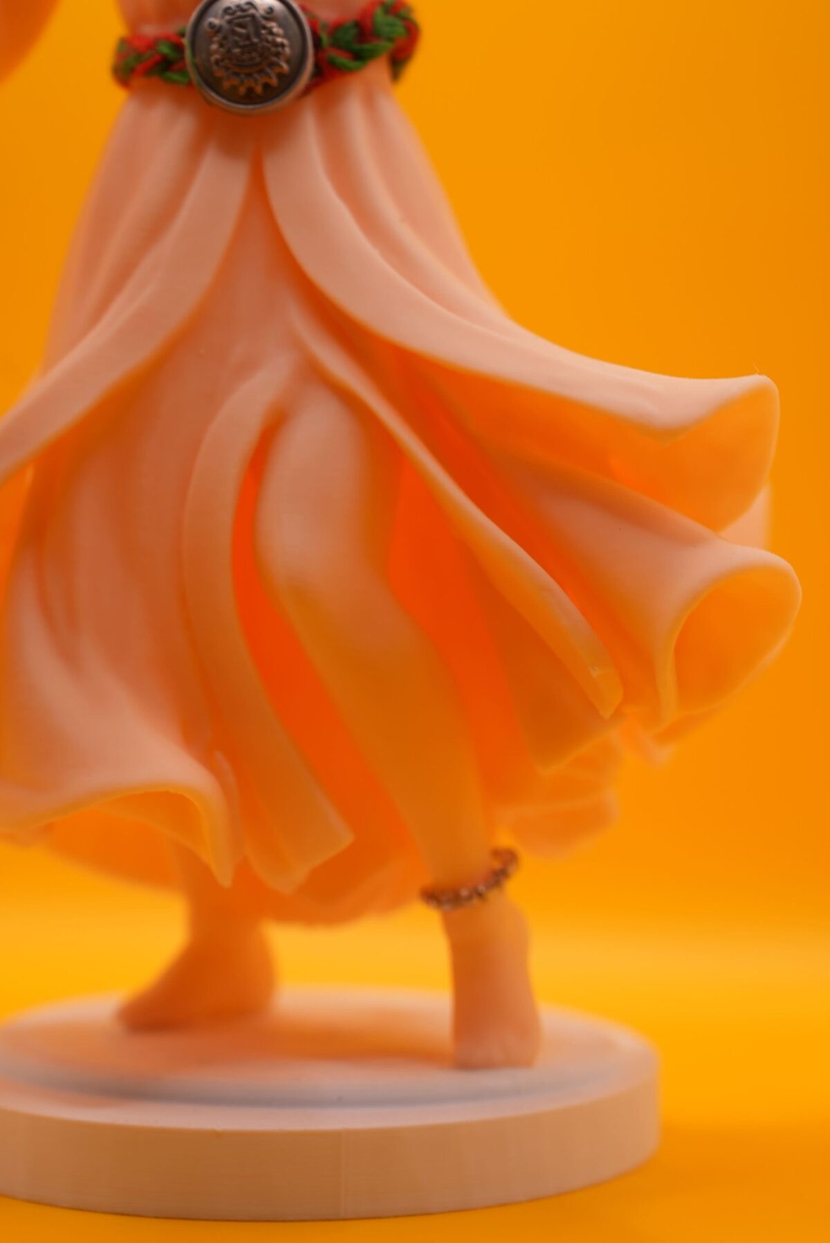 3D-printed PLA statue of the Diva of Moroccan Andalusian music, wearing traditional flowing dress and jewelry, with graceful dancing posture.