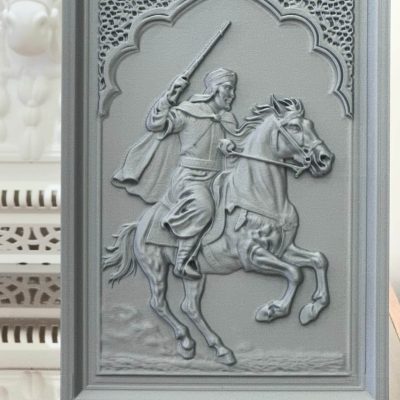 3D-printed Fantasia Horseman Relief Sculpture featuring Moroccan rider on galloping horse framed in Moorish arch with decorative mashrabiya pattern.